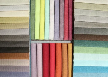 colorful-fabric-swatch-palette-upholstery-curtain-design-assorted-textile-swatches-neatly-arranged-sample-board-393299894