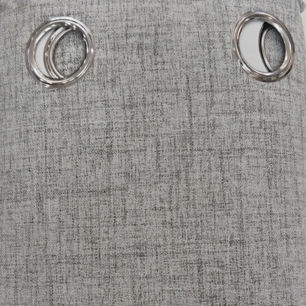 Add sleek sophistication to any room with our eyelet blockout curtain in sleek silver tone. Designed with a contemporary eyelet finish for easy hanging, this ready‑made blockout curtain ensures complete darkness, insulation, and privacy while elevating your décor